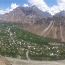 Hemmed in by gigantic Booni Zom (6,542 m) to the East and Hindukush Mountain Range to the West, Booni Town is located 85 kilometers to the north-east of district Chitral (Lower). Spread around 8 square kilometers, it is the headquarter of the newly established district Chitral Upper. <br /><br />Traditional hospitality marked by indigenous cultural values, peace, friendliness and care on the part of local communities and tourism service providers reinforced by its new status as headquarter of the freshly established district Chitral Upper, the town has grown in importance and reputation as an attractive tourists destination.   <br /><br />The organic kitchen gardens and cool orchards laden with a variety of fresh, delicious and juicy fruits i.e. apple, apricot, mulberry, strawberries (both wild and gardened), peaches, pears and grapes, Booni has a long-standing tradition of receiving and hosting tourists, particularly foreign tourists, who have had visited this remote mountain settlement for teaching in schools and carrying out cultural studies. <br /><br />Given its suitable launching points from Zani Pass, Shipishoon and Booni Zom and unobstructed landing spots coupled with the buoyancy of the ever-persisting thermals, the Town is dubbed as ‘Heaven for Paragliders’ and attracts reputed national and international paragliders every year. The world record of longest paragliding (non-stop 10 hours) from Birmoghlasht (district Lower Chitral) to Hunza valley (Gilgit Baltistan) was established in 2010 here in Chitral by Brad Sander, a reputed paraglider from the US. <br /><br />There are short and long duration natural treks here catering to the stamina and taste of different age groups. It is both refreshing and rewarding to climb up the Dono peak—a nose-touching steep rock right in front of the Town—that takes a full day for climbing and trekking. <br /><br />Atop the peak, one can have a panoramic view of the towering snow-capped mountains including the fabulous Terichmir Peak (7,708m) and Booni Zom in the surrounding. Shagram and Khot villages of Torkhow valley and Mastuj in the Byar region are clearly visible to the naked eyes from this point. A camera mounted with powerful lances, can greatly help to take take best pictures of the beautiful surrounding from this point on a cloudless day. <br /><br />There are clean and affordable village guesthouses besides the Motel of Pakistan Tourism Development Corporation (PTDC). Located in a vast and picturesque landscape with clean and airy rooms and gardens showcasing a variety of flowers, fruit bearing trees and well-maintained lawns carpeted with soft grasses, accommodation in PTDC offers true comfort for guests willing to take rest after long  and exhausting trekking, paragliding or cycling from Gilgit to Chitral and vice versa. <br /><br />Booni has a vast polo pitch where Free Style Polo is played by every weekend from early spring to late autumn. Young generation is passionate about keeping horses and adopting Free Style Polo as a hobby. This also offers thrilling opportunity for horseback riders. The reputed three-day Qaqlasht festival featuring free style polo organized here in the second week of April every year. It attracts large number of tourists—both local, national, and international.